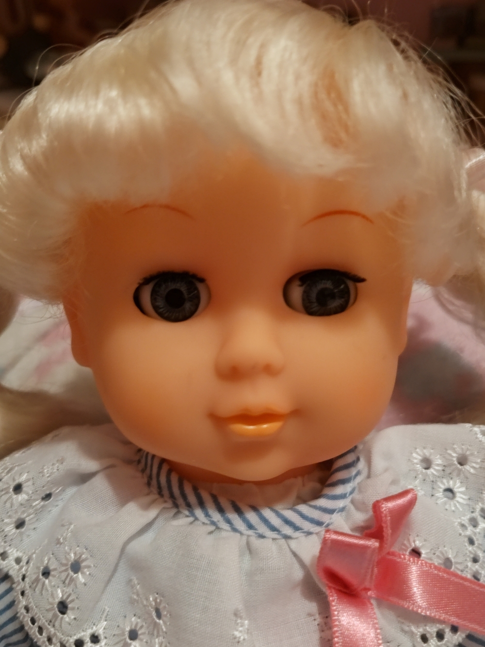 Vintage  Blonde Hair Doll with Blue Eyes and Pink Bow